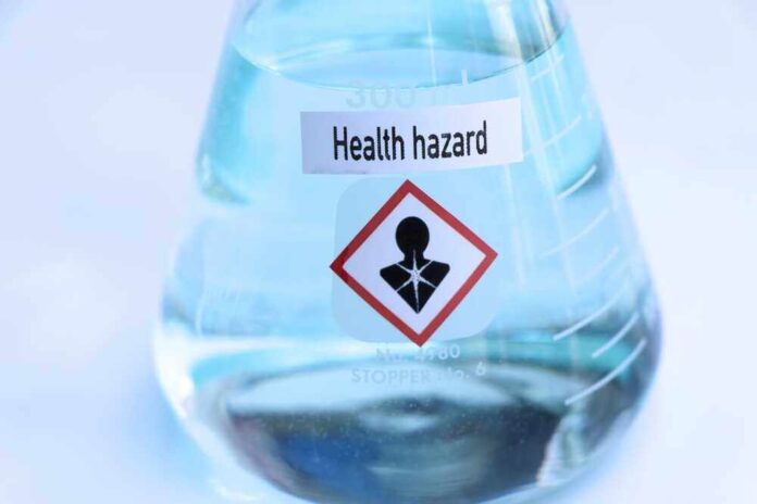 shutterstock_2409867397.jpg featured image Flask labeled Health hazard with warning symbol.