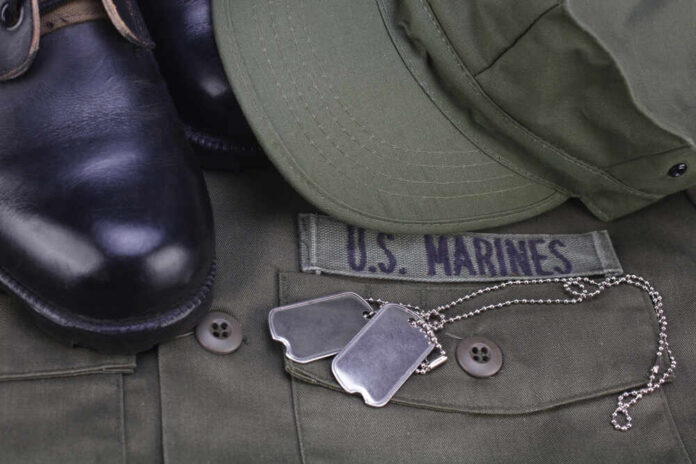 shutterstock_1630141729.jpg featured image US Marines uniform with boots and dog tags
