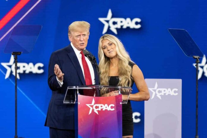 shutterstock_2187507761.jpg featured image Riley Gaines and President Trump