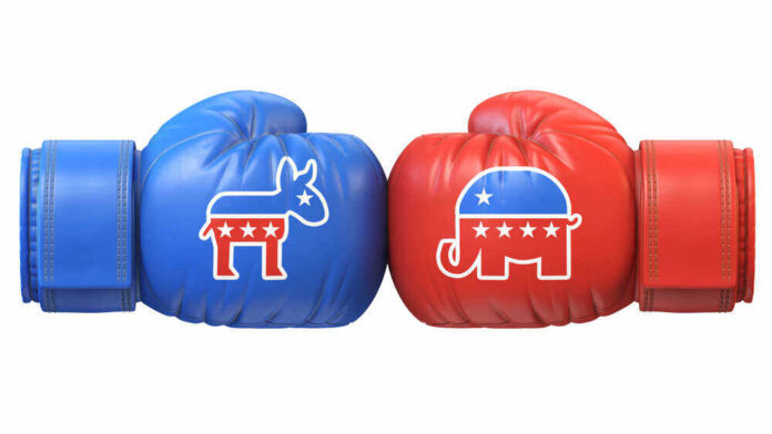 shutterstock_1213177786.jpg featured image Blue donkey and red elephant boxing gloves facing off.