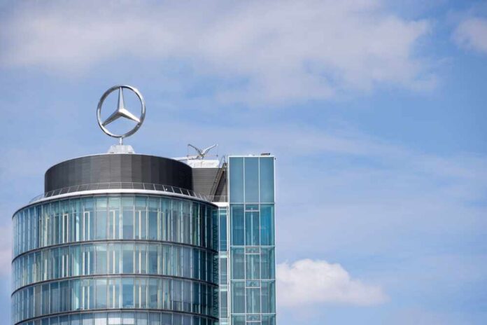 shutterstock_2513041201.jpg featured image Glass building with silver circle logo on top