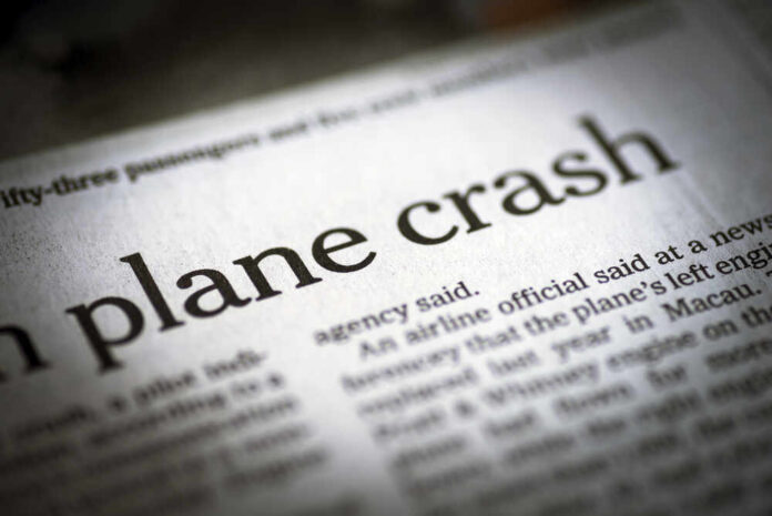 shutterstock_290501621.jpg featured image Newspaper headline about a plane crash.