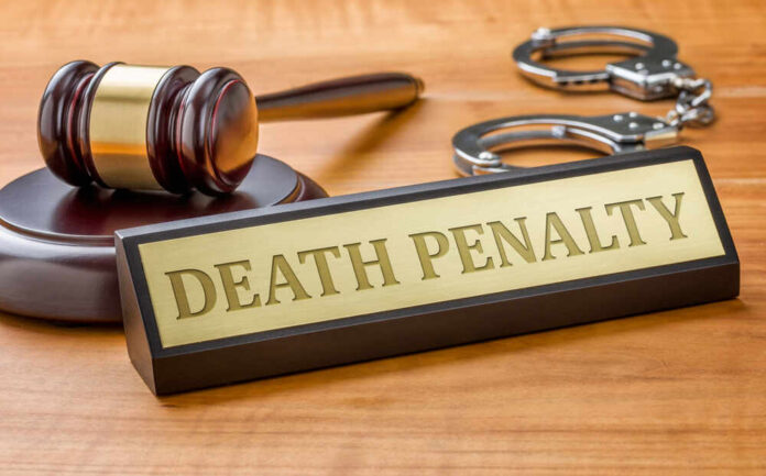 shutterstock_346370309.jpg featured image Gavel handcuffs and death penalty sign on table