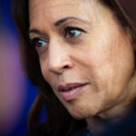 Kamala Harris with serious expression looking off-camera.