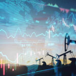 Oil pumps and financial charts against world map