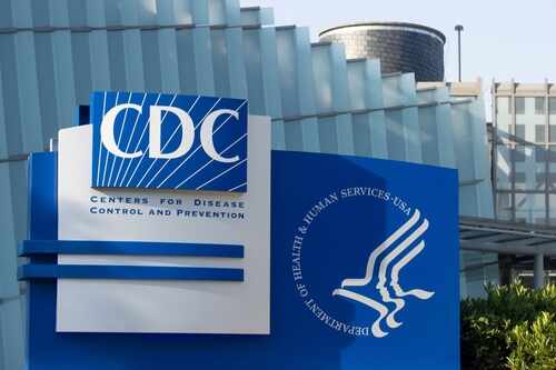 shutterstock_2426091405.jpg Signage of the CDC building displaying its name and logo