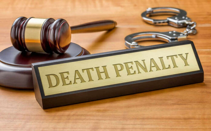 shutterstock346370309jpg Gavel handcuffs and death penalty sign on table