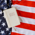 Conservative Kingmaker Dies — Christian Conservatives Mourn His Passing Bible on an American flag background