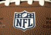 Close-up of NFL logo on American football