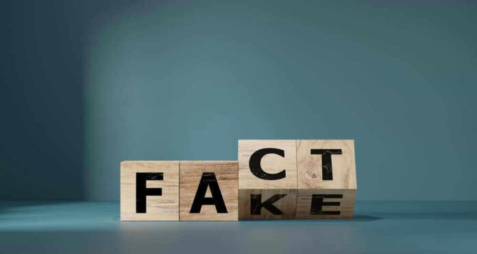 shutterstock_2405017025.jpg Wooden blocks displaying FACT and FAKE juxtaposed.