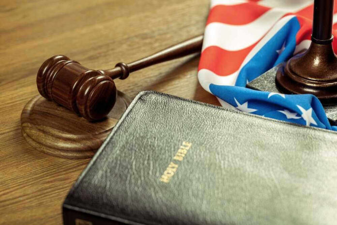 shutterstock_295811360.jpg Gavel, Holy Bible, and American flag on a desk
