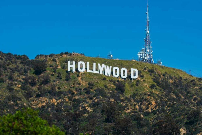 Hollywood sign on a green mountain hillside