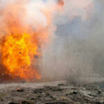 A large explosion with flames and smoke.