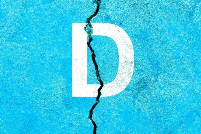 White letter D on cracked blue surface.
