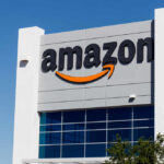 Amazon Disaster — 72 Stores Dead! Exterior view of an Amazon building with a prominent logo