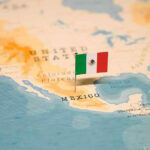 Map showing Mexico with a Mexican flag pin.
