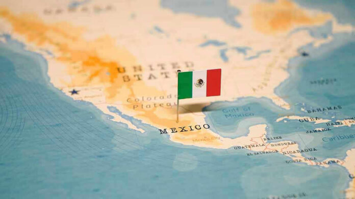 Map showing Mexico with a Mexican flag pin.