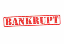 Red stamped word bankrupt on white background