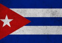 Deadly Cuba Shootout Involving Florida Speedboat Cuban flag featuring red triangle, white stripes, and a star