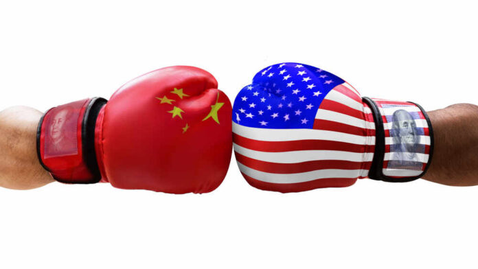 Boxing gloves representing China and the USA facing each other