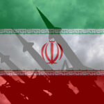 Silhouette of missiles in front of the Iranian flag
