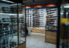 Interior of a gun shop showcasing various firearms on display