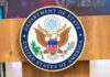 United States Department of State seal on podium