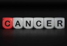 Cancer Diagnosis Hits Trump’s West Wing Blocks spelling the word 'CANCER' with one block in red