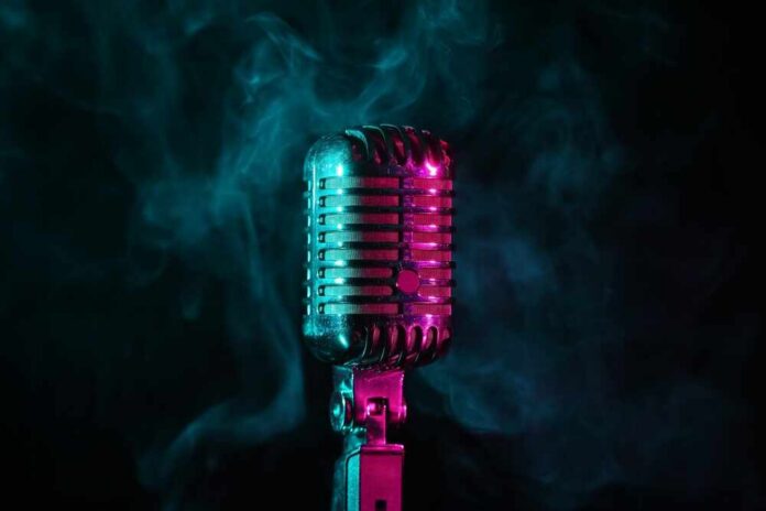 A vintage microphone surrounded by colorful smoke