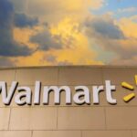 WALMART Issues Warning — 50,000 Recalled NOW Walmart sign against a cloudy sky