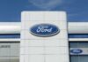 Ford-Carhartt Super Duty Stuns Detroit Exterior view of a Ford dealership with the logo prominently displayed