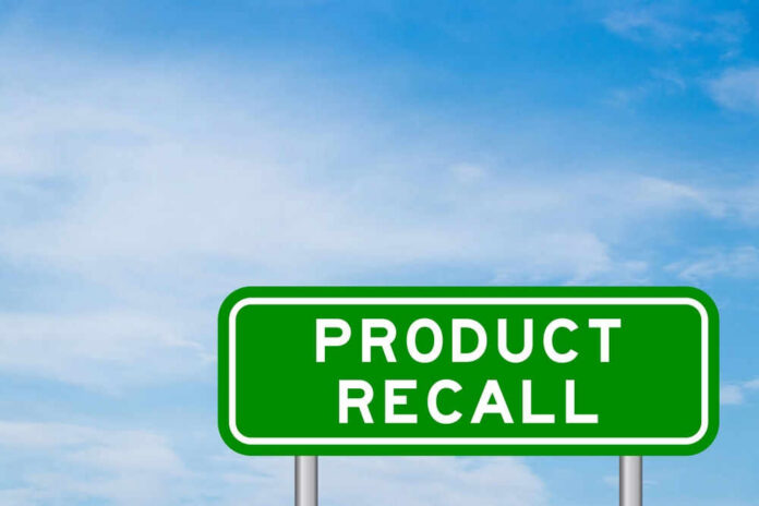 shutterstock_2182367505 Green sign with product recall text and sky background