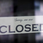 Beloved 141-Year-Old Candy Icon Shuts Stores A sign hanging in a window that reads 'Sorry, we are CLOSED'