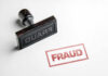 Feds Drop Hammer On THIS State Fraud Fraud stamp and red stamped imprint on paper