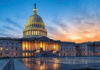 House GOP Revolt? Trump Slams It U.S. Capitol building at sunset with reflection, Washington D.C.