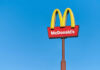 McDonald’s Brings Back The OG Pie — Fans Can’t Wait! McDonald's restaurant sign against a clear blue sky
