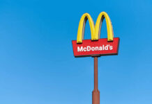 McDonald’s Brings Back The OG Pie — Fans Can’t Wait! McDonald's restaurant sign against a clear blue sky