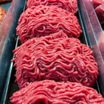 Ground beef on display at a butcher shop.