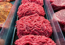 Burger Price Shock Slams Cookouts Ground beef on display at a butcher shop.