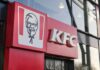 Exterior view of a KFC restaurant with its iconic logo