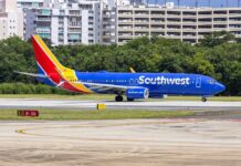 Southwest Airlines airplane taxiing on the runway