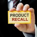Recall: THIS Mac & Cheese Pulled Nationwide Hand holding a product recall card