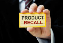 Recall: THIS Mac & Cheese Pulled Nationwide Hand holding a product recall card