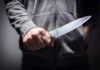 One Push, One Deadly Knife Murder A person holding a knife in a threatening manner