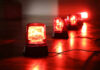 VIDEO: Mall Floor Vanishes After Blast Red emergency lights on dark floor, illuminating the area.