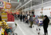 Gunfight Erupts Inside THIS Grocery Store Customers waiting in line at a supermarket checkout.