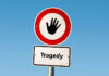 TRAGEDY: Fourth Firefighter Dies — What Went Wrong? Road sign with hand stop symbol and a lower sign reading Tragedy