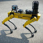 Robot Spies BANNED — FCC Draws Blood Fourlegged yellow robot dog on concrete ground