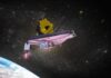 Webb Spots New Planet? Astronomers Hold Breath James Webb Space Telescope in orbit above Earth with a starry background
