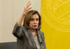 Pelosi Involved In Hit-And-Run Nancy Pelosi gestures while speaking in front of yellow backdrop.